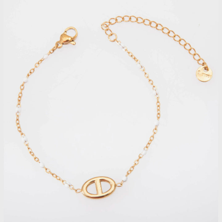 Bracelet Célia, perles émaillées blanches et maillon marine doré