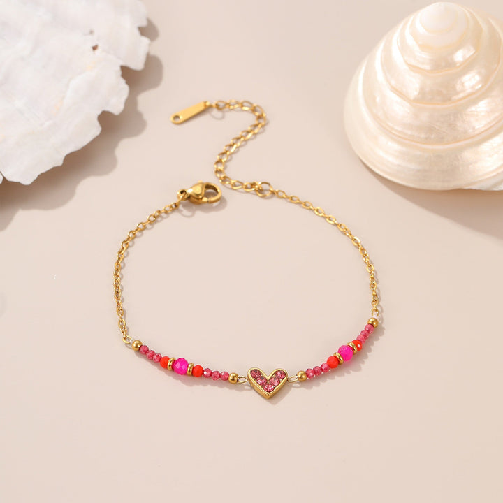 Bracelet Honey, cœur serti rose sur chaîne fine dorée