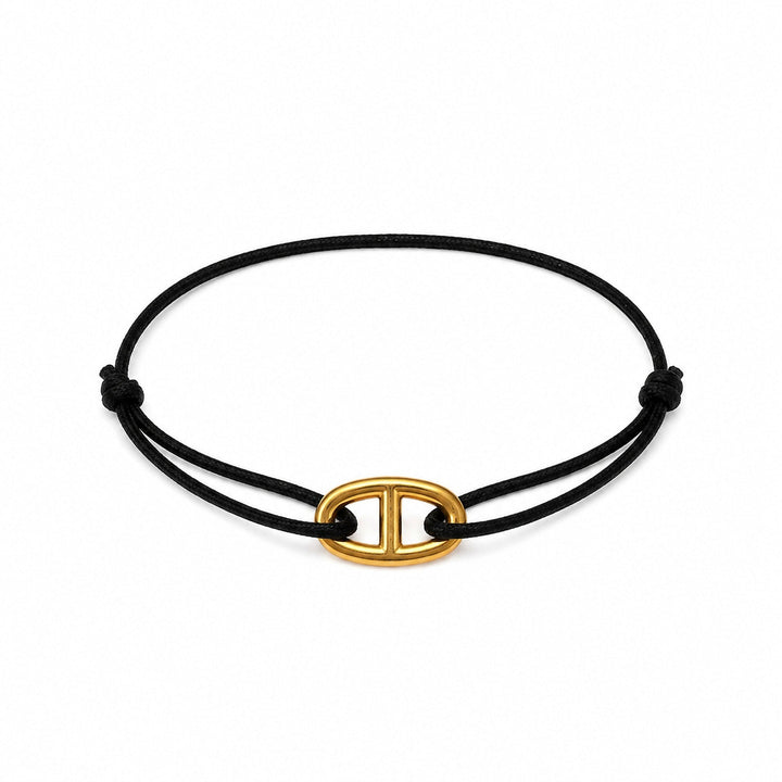 Bracelet Léa, cordon noir et maillon marine doré