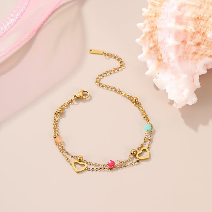 Bracelet Maïa, double rang doré et cœurs entrelacés